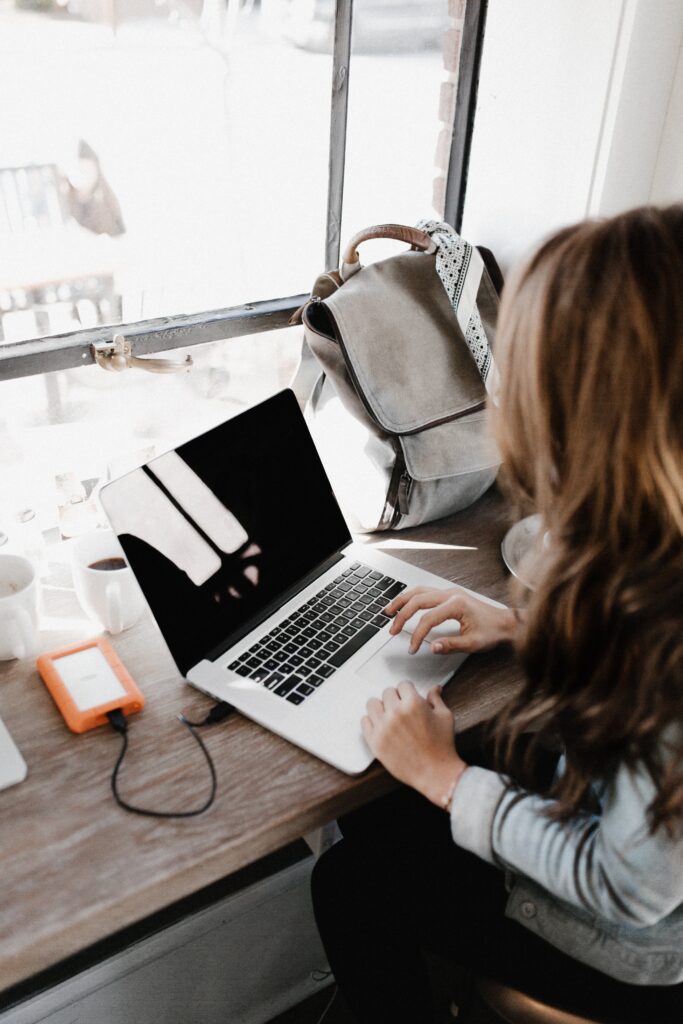 Female typing on laptop