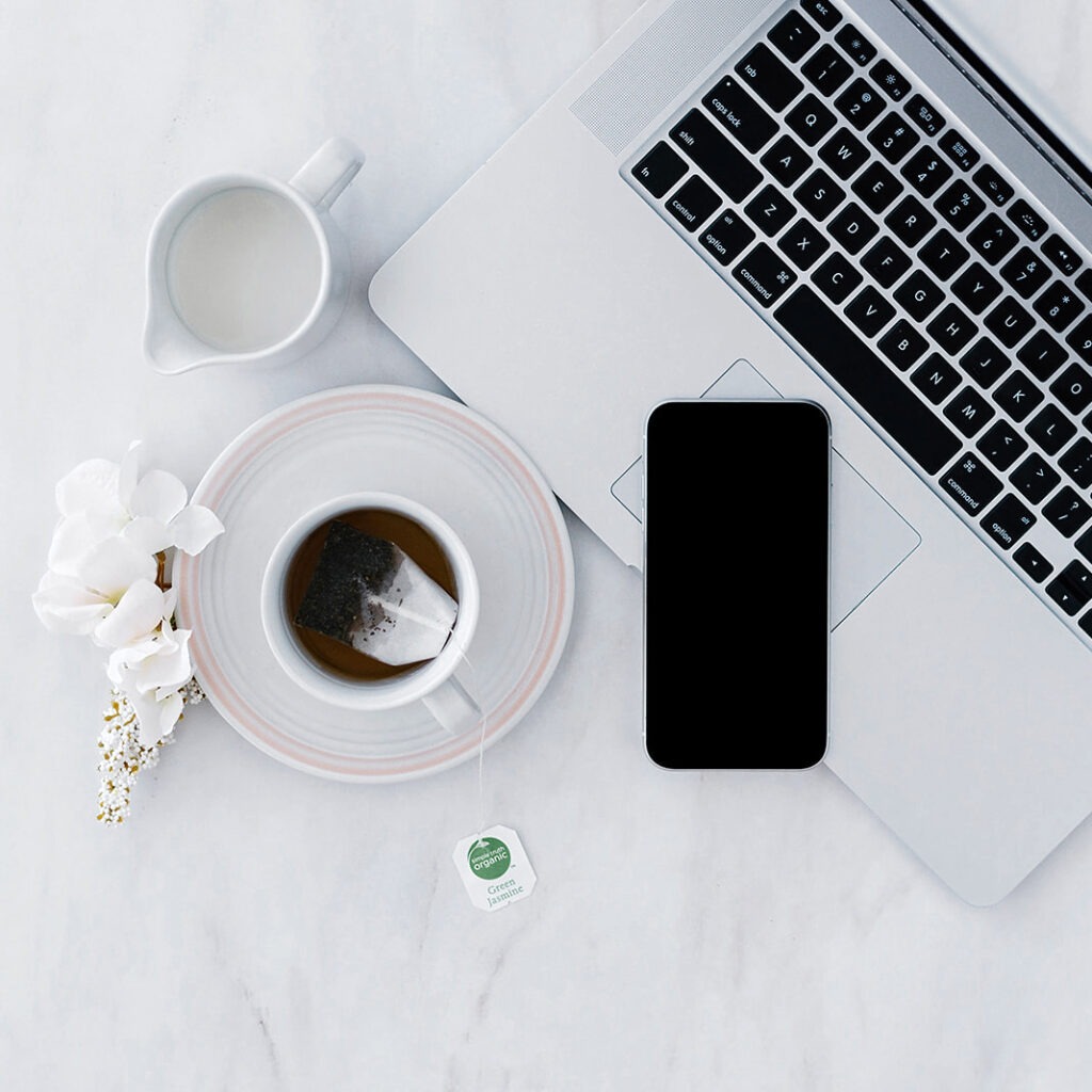 white background, Macbook, iPhone and coffee