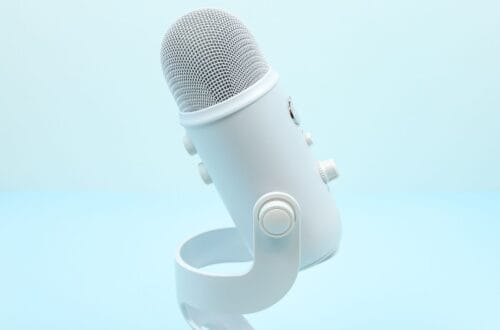 White Blue Yeti Microphone on a blue background