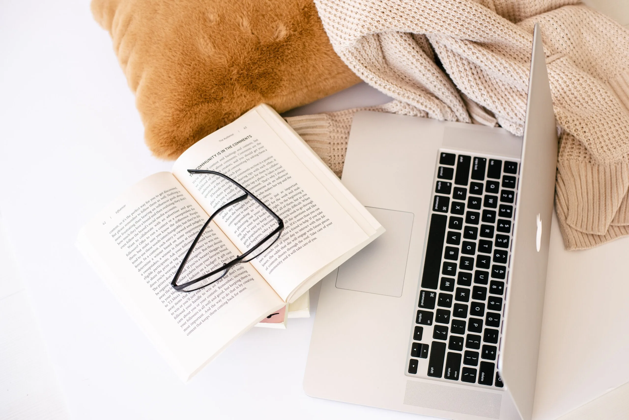 Book, glasses, laptop