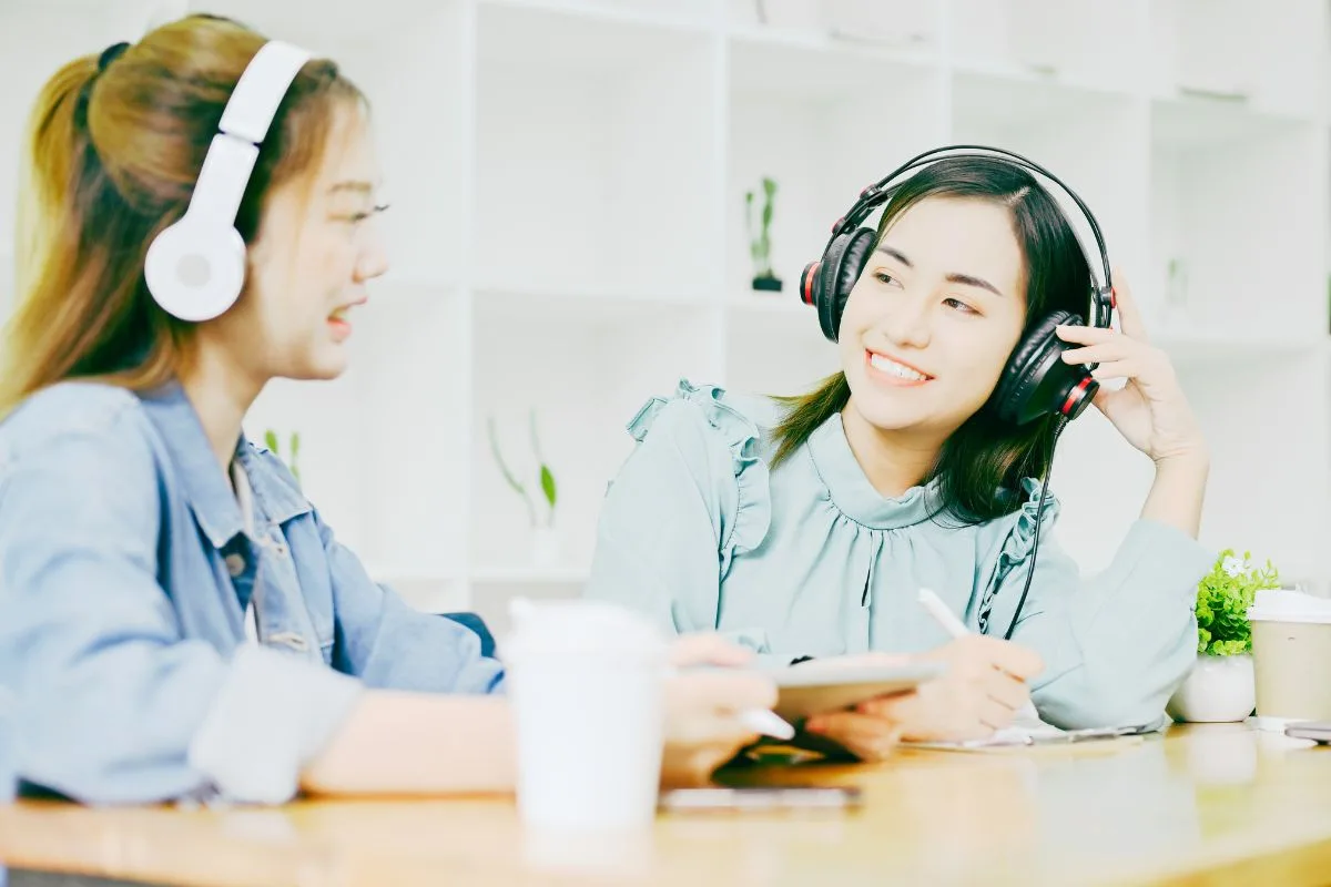 Do podcast guests get paid? Podcaster interviewing guest for show