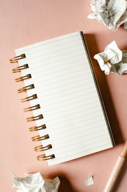 Listing ideas in a notebook for when you don't know what to podcast about