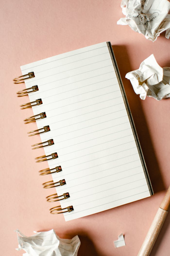 Listing ideas in a notebook for when you don't know what to podcast about